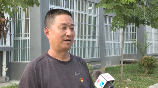 关庙镇沈家岭社区党支部书记王洪平.png